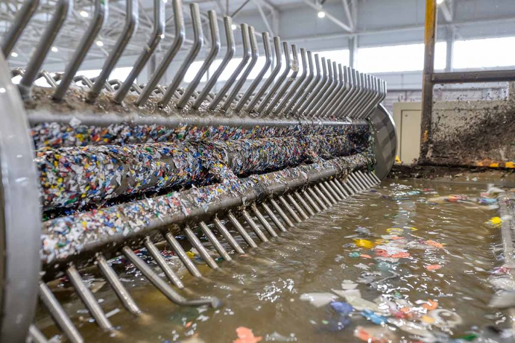 Plastics recycling processing equipment with washing water.