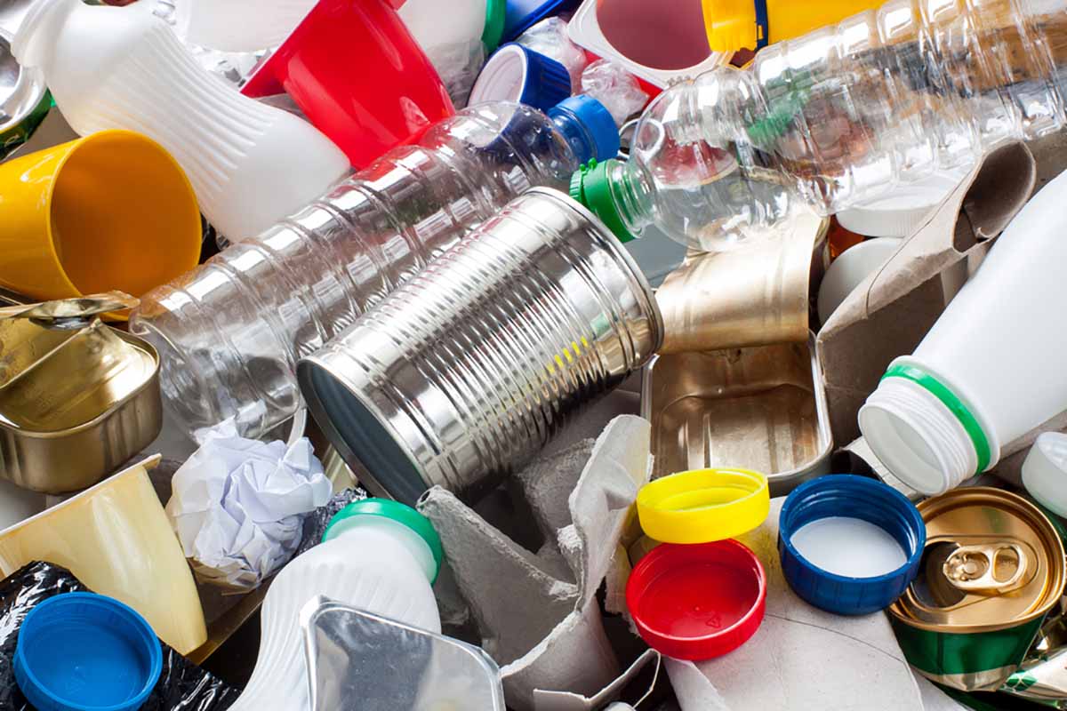 Mixed residential recyclables in a pile.