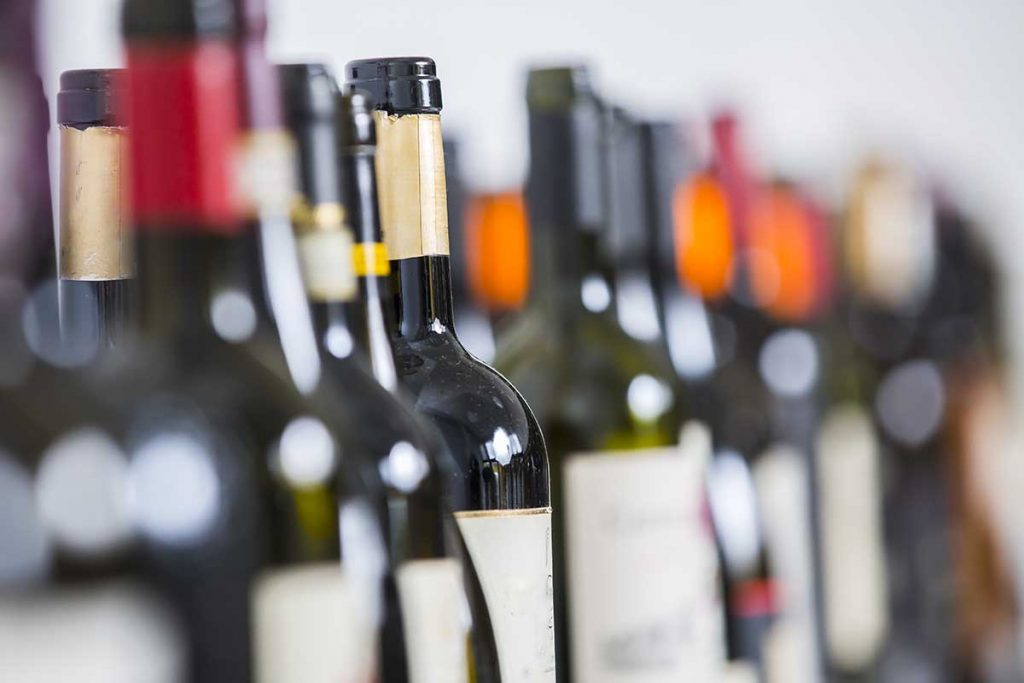 Empty glass bottles for recycling